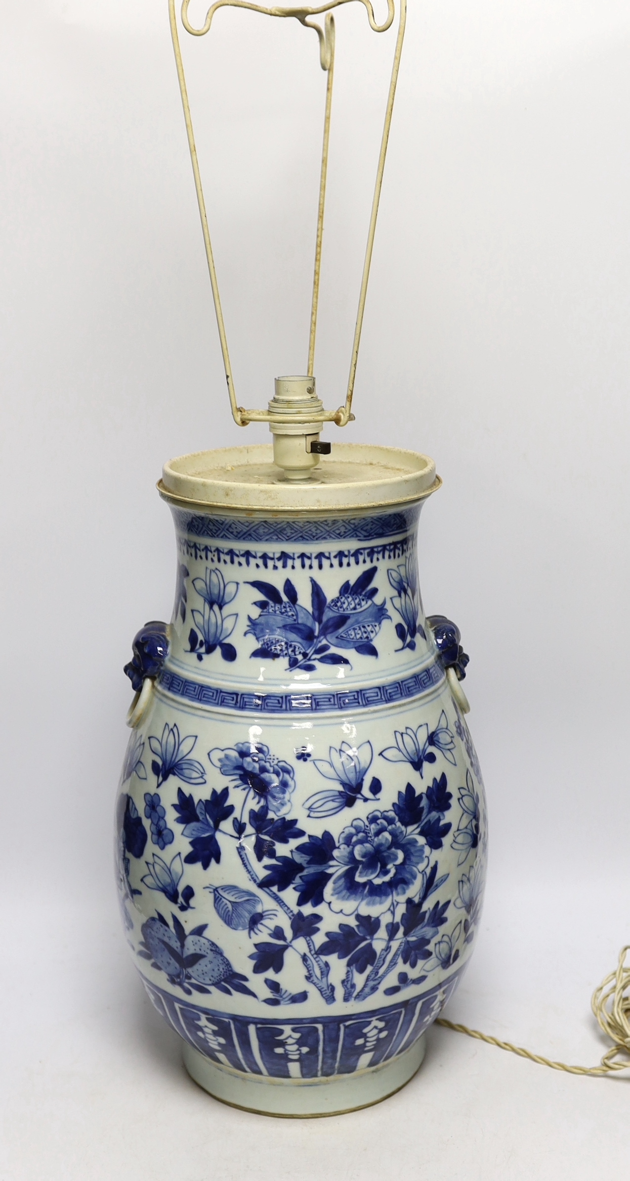 A late 19th century Chinese export porcelain blue and white Hu vase, painted with peaches (converted to a table lamp, drilled), vase 38.5cm